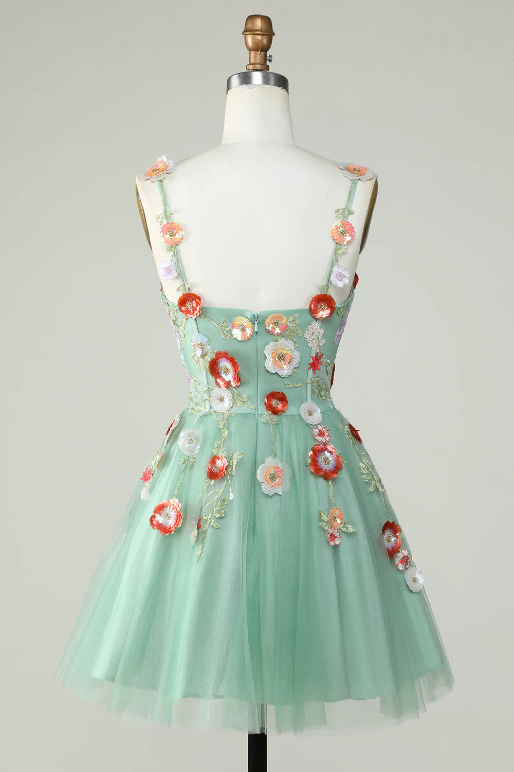 Back view of A-line mini dress with spaghetti straps and sequin details.