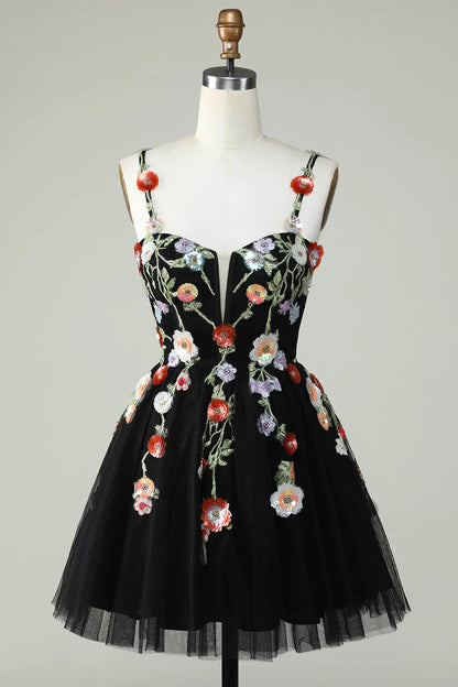Front view of black A-line mini dress with spaghetti straps and sequin details.