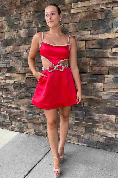 Back view of the sparkling homecoming dress showing spaghetti straps and bow.