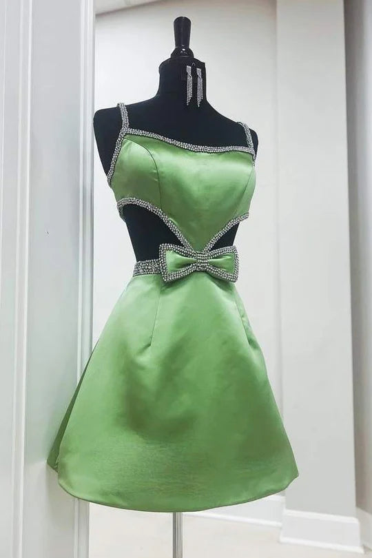 Full length view of the sparkling spaghetti strap homecoming dress.