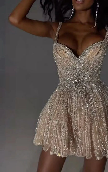 Full length view of the silver sequin dress, showcasing its sparkling fabric.