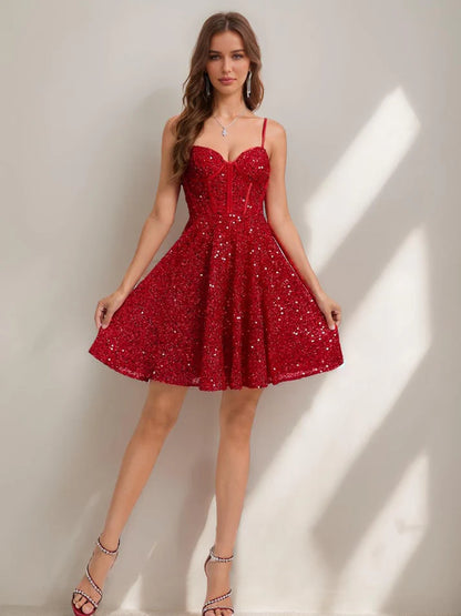Close-up of sequin fabric on short homecoming dress.
