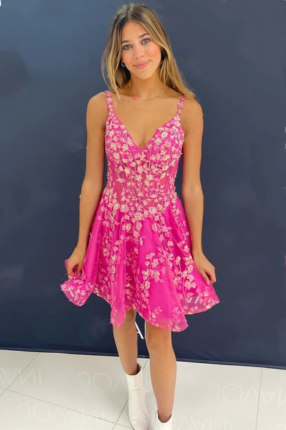 Full view of a model wearing the hot pink A-line V-neck short homecoming dress with floral appliques and beading.