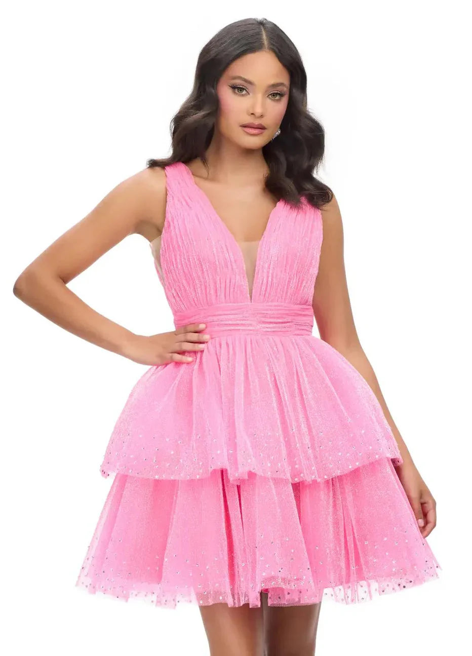Model wearing a lavender V-neck sleeveless glitter tulle tiered mini homecoming dress.