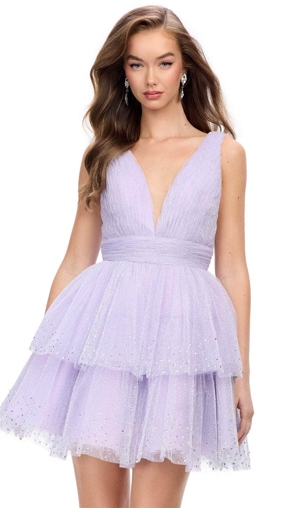 Close-up of the hot pink glitter tulle tiered skirt of the mini homecoming dress.