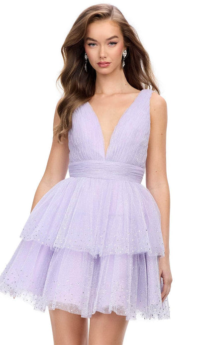 Close-up of the hot pink glitter tulle tiered skirt of the mini homecoming dress.