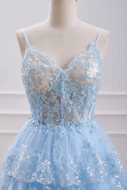 Side view of a light blue sequin homecoming dress, showcasing the A-line skirt.