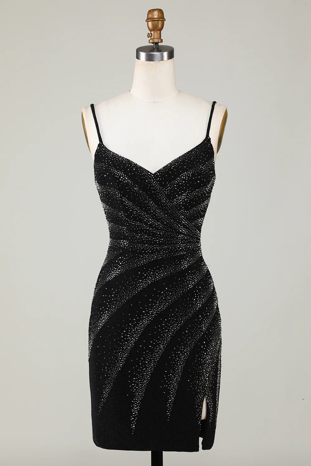 Model wearing a black sparkling V-neck dress, similar to the royal blue design.