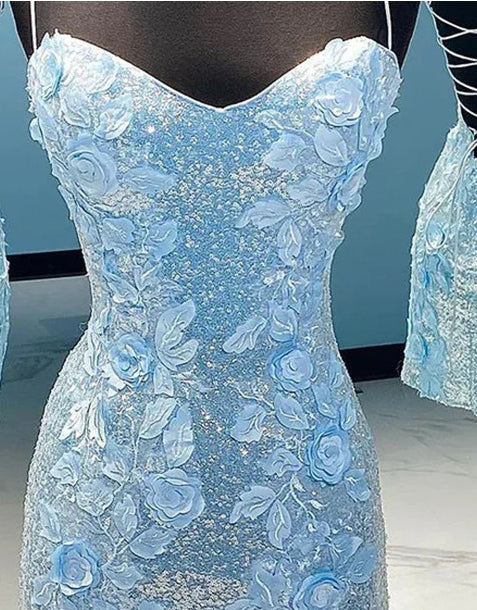 Back view of the blue bodycon homecoming dress, showing the fitted silhouette.