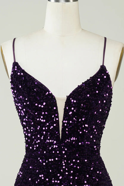 Full length view of purple sequin formal dress.