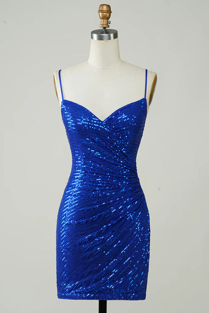 Royal blue sequin bodycon mini dress with spaghetti straps and lace-up back.