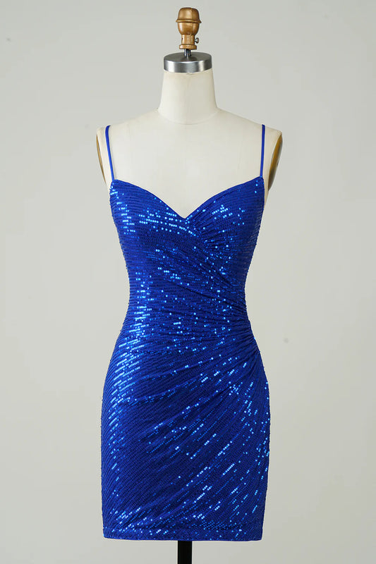 Royal blue sequin bodycon mini dress with spaghetti straps and lace-up back.