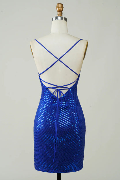 Back view of a royal blue sequin mini dress showing the lace-up detail.