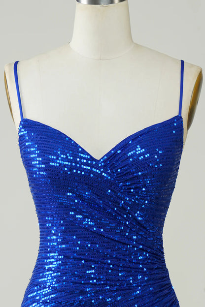 Close-up of the sequin detail on a royal blue bodycon dress.
