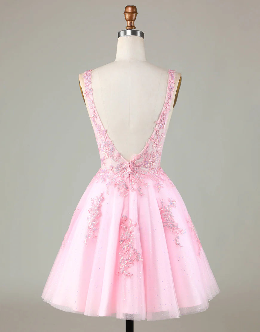 Full view of a Koutun pink glitter A-line dress, showcasing its sweetheart neckline and short length.