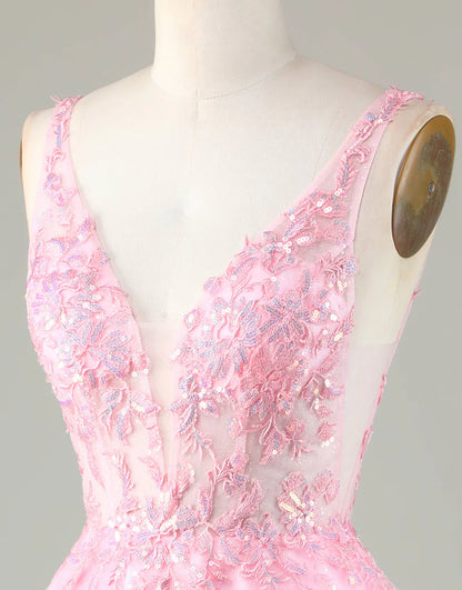 Close-up of the delicate appliques and shimmering glitter on the pink A-line homecoming dress.