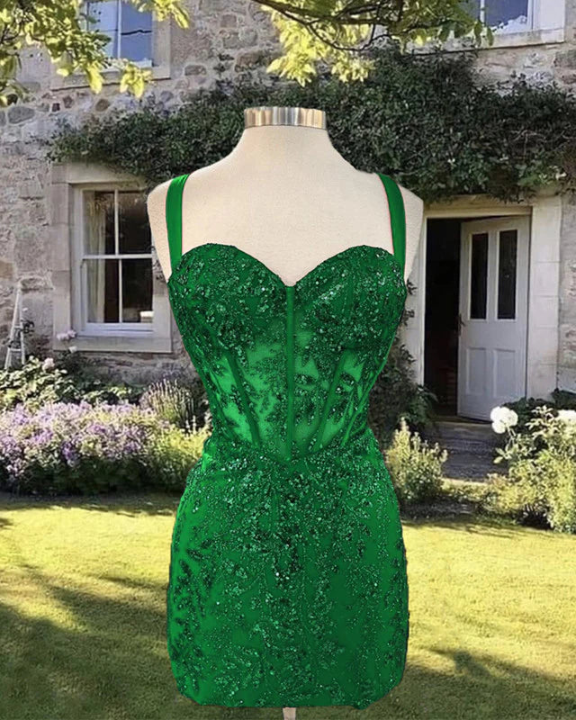 Model wearing a short green sequin corset homecoming dress.
