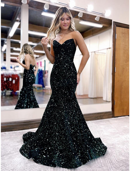 Close-up of the sequin embellishments on a mermaid prom dress.
