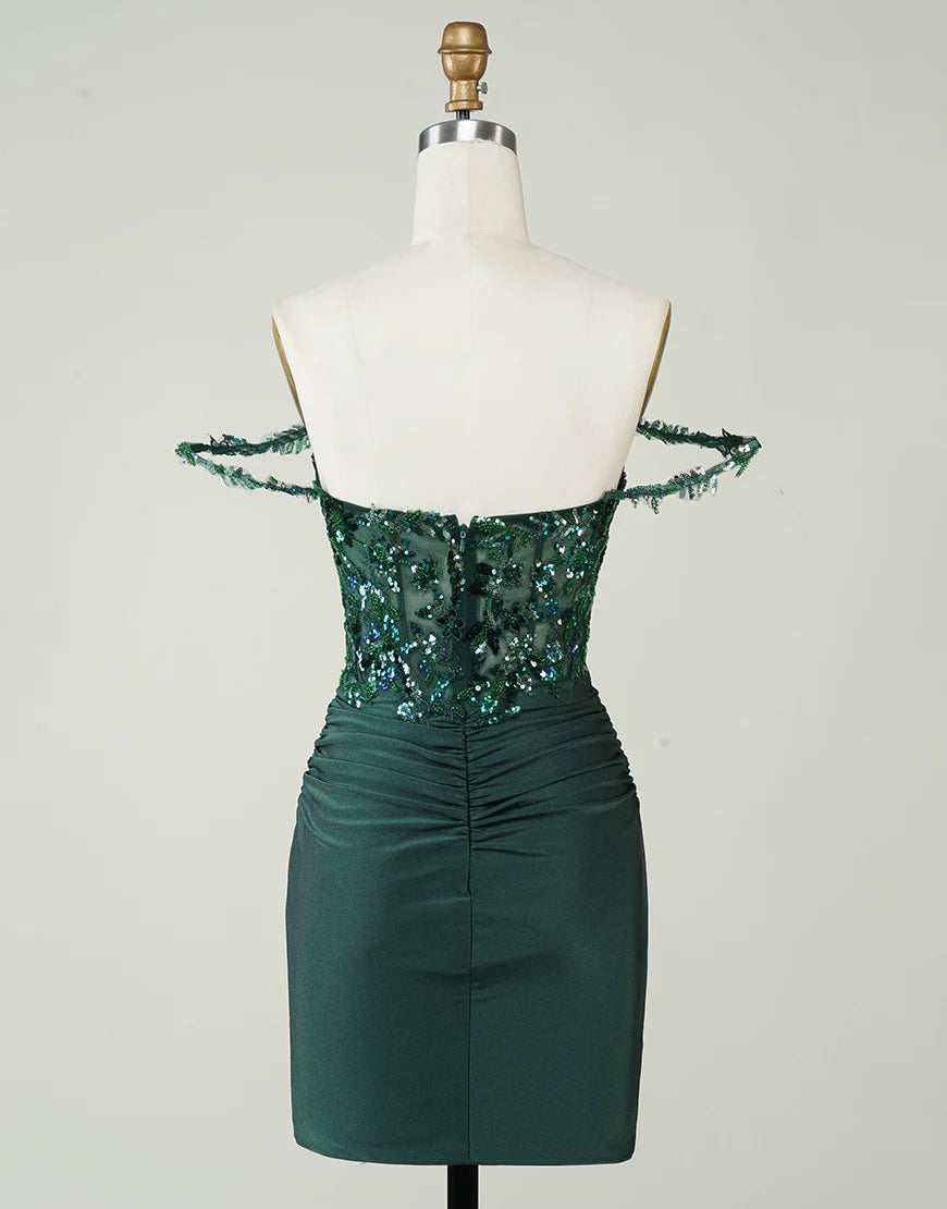Back view of the dark green sequined off-shoulder dress.