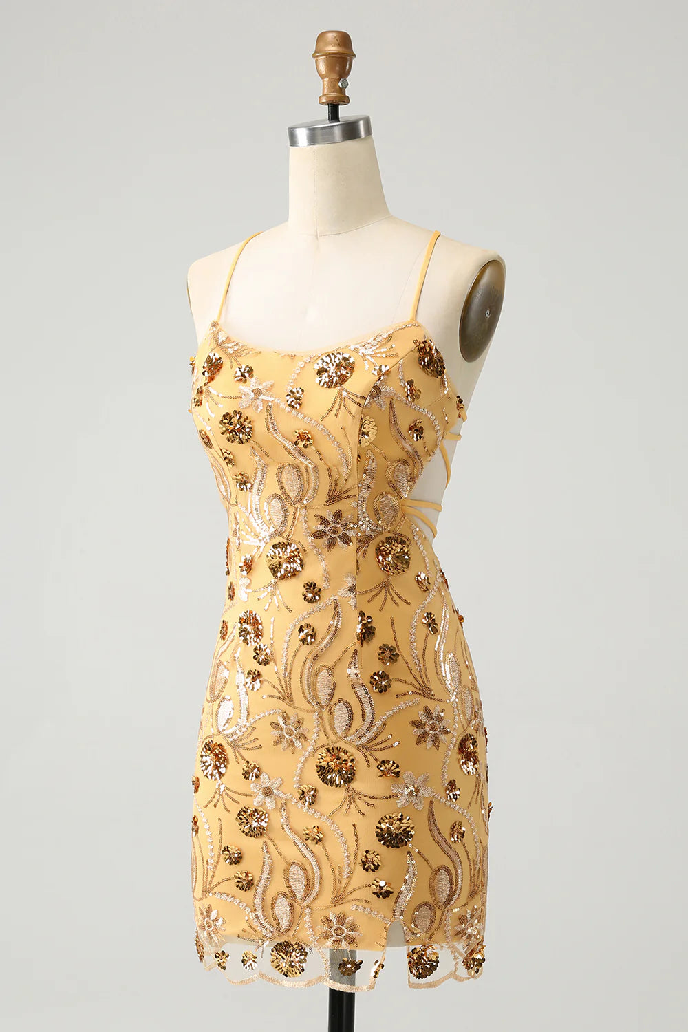 Back view of the yellow beaded tight formal dress.