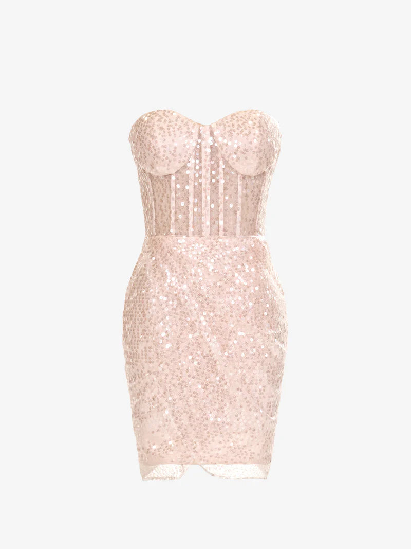 Model wearing a pink sequined sheath dress with a sweetheart neckline.