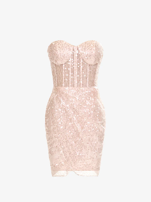 Model wearing a pink sequined sheath dress with a sweetheart neckline.