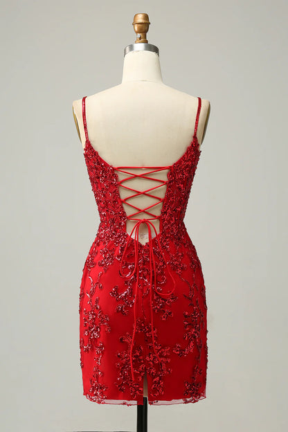 Back view of a red sequined dress with criss-cross straps.