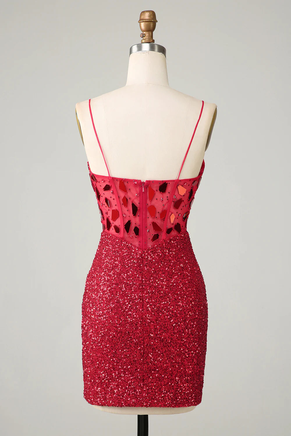 Side view of a red sequin corset homecoming dress with shimmering mirror details.