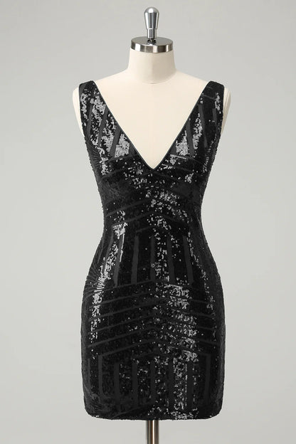 Detail of the detachable ruffles on the dark green sequin dress.