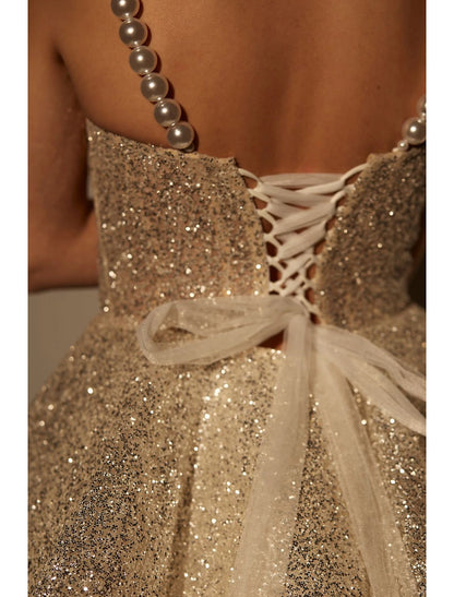Side view of a pink A-line glitter tulle cocktail dress.