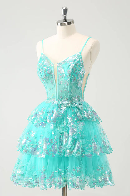 Back view of the elegant green A-line sequin dress with delicate spaghetti straps.