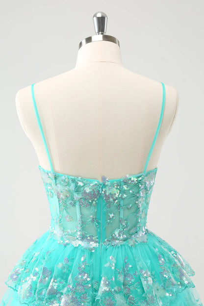 Another angle of the sparkly green tiered sequin dress, perfect for formal events.