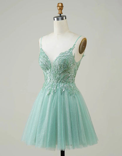 Back view of the sparkly green mini homecoming dress.