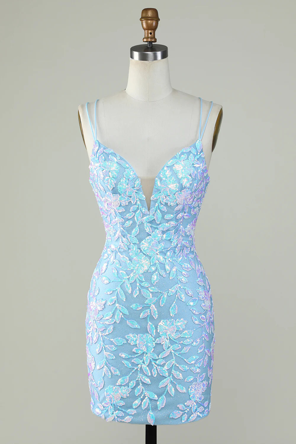 Light blue sparkly V-neck dress with lace-up back, front view.