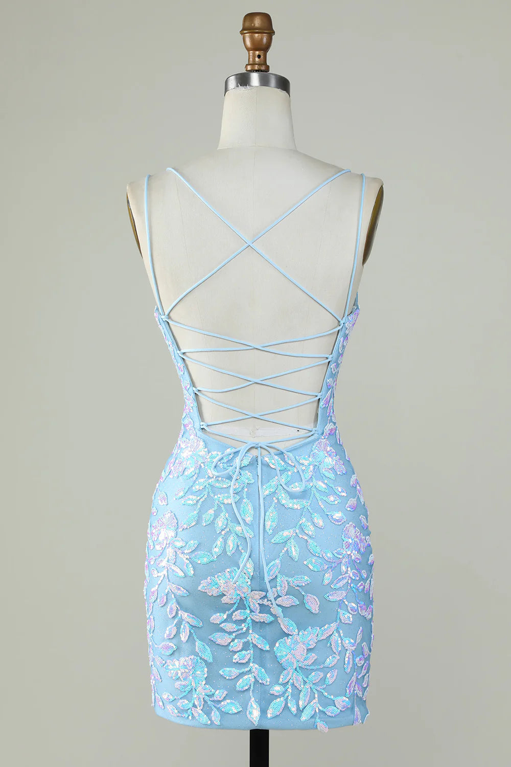 Light blue sparkly V-neck dress, side view, showing backless design.