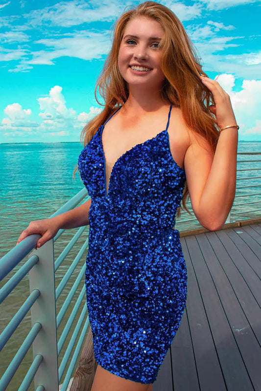Front view of a woman wearing a sparkly gold V-neck backless sequin short homecoming dress.
