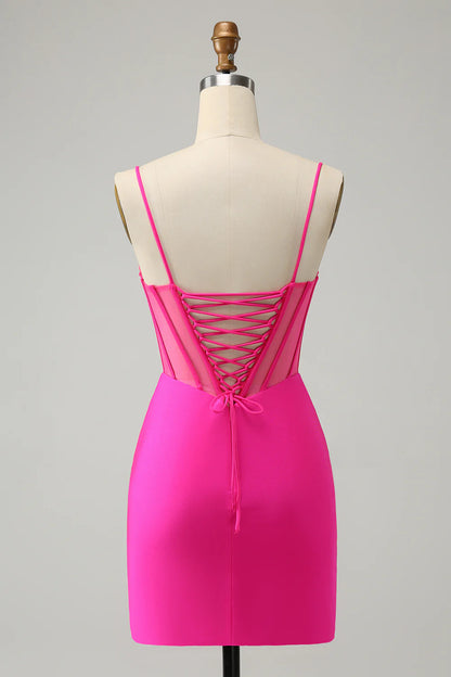 Back view of fuchsia sparkly beaded corset short homecoming dress.