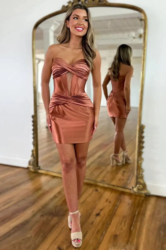 Model wearing a sparkly bodycon short homecoming dress with a sweetheart keyhole neckline.