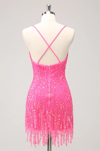 Back view of a hot pink sequin bodycon dress with V-neck and fringes.