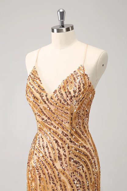 Side view of a gold sequin bodycon dress with V-neck and fringes.