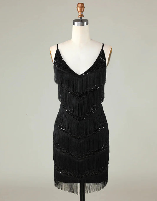 Model wearing a black sparkly V-neck short homecoming dress with tassels.