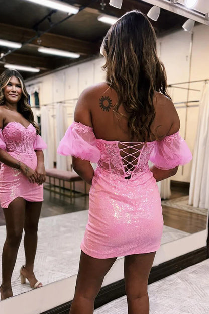 Back view of the pink sequin corset dress showing lace-up detail.
