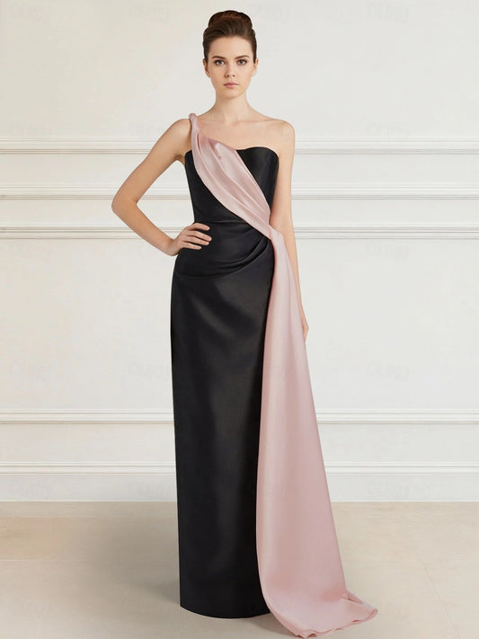 Model wearing Koutun one-shoulder color block satin formal gown.