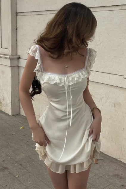 Model wearing a sweet lace square neck satin short homecoming dress.
