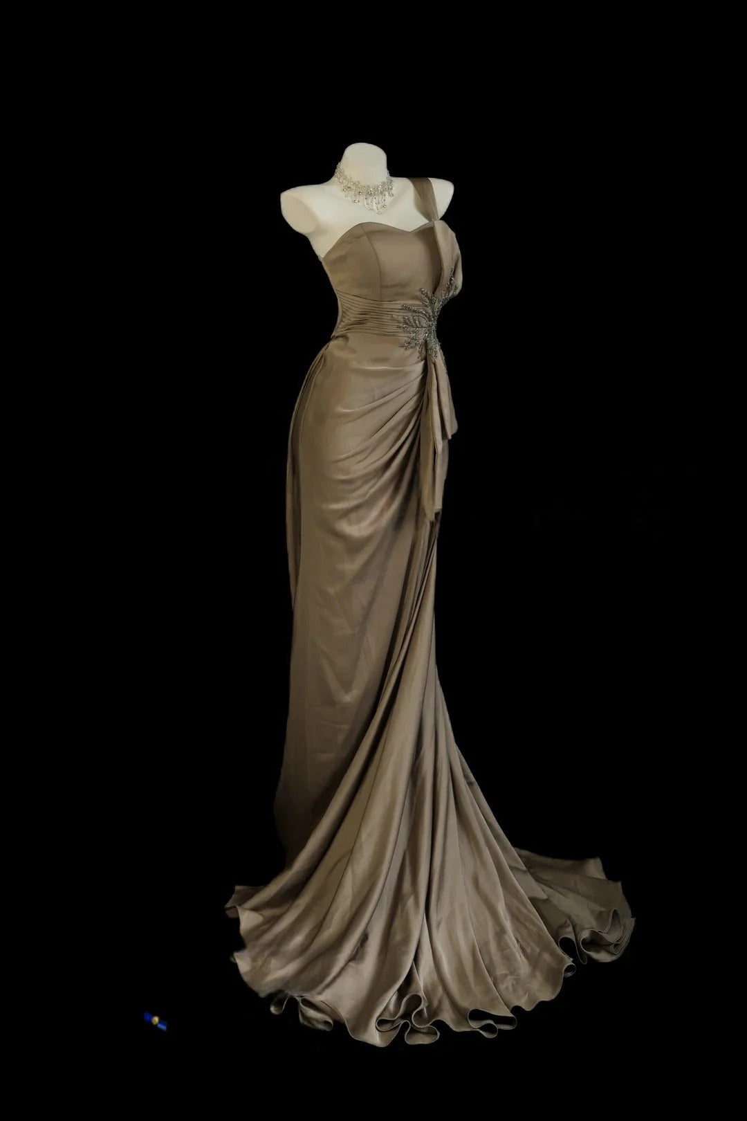 Taupe One Shoulder Prom Dress With Crystal Starburst Embellishment And Satin Drape Formal Prom Dress
