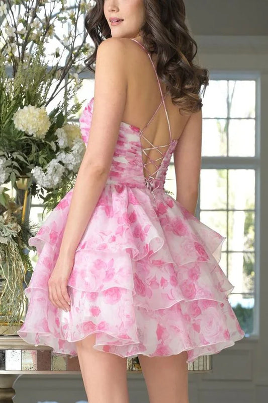 Side view of the layered print A-line short dress, showcasing its flowing skirt.