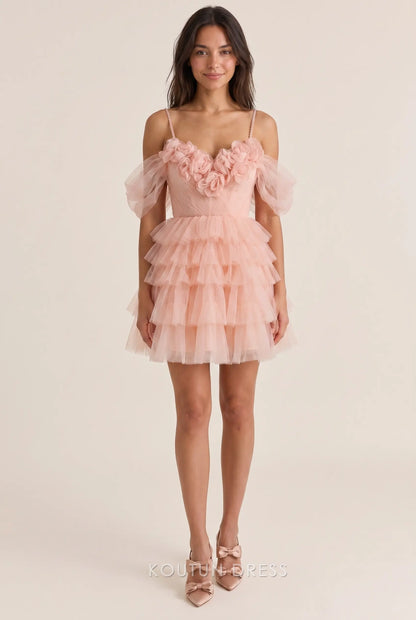 Model wearing a whimsical off-shoulder sweetheart tulle mini homecoming dress with 3D floral appliqués.