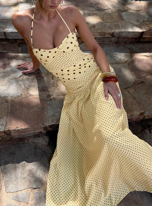 Yellow Polka Dot Halter Prom Dress with Sweetheart Neckline and Flowy Maxi Skirt for Formal Events and Prom Nights