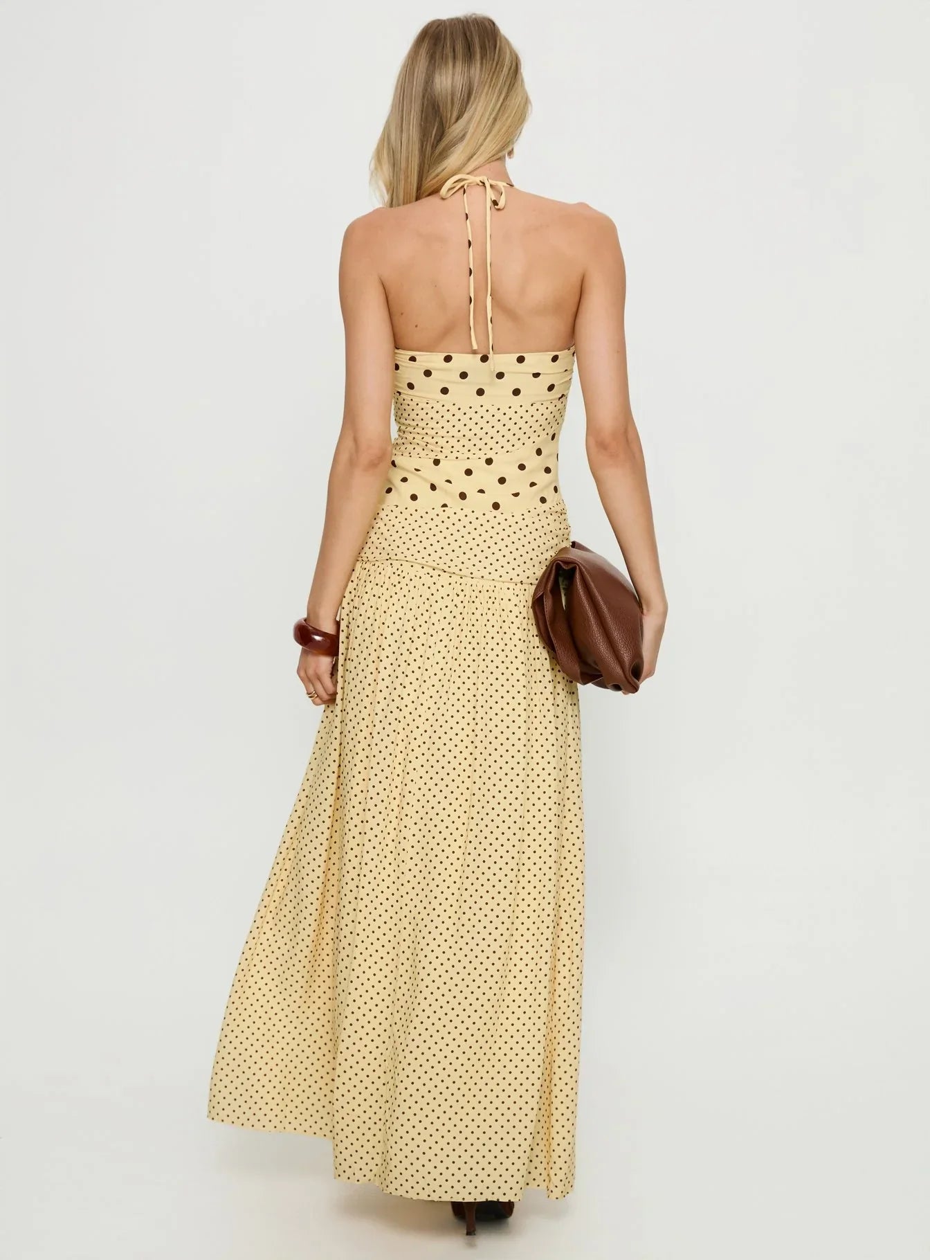 Yellow Polka Dot Halter Prom Dress with Sweetheart Neckline and Flowy Maxi Skirt for Formal Events and Prom Nights