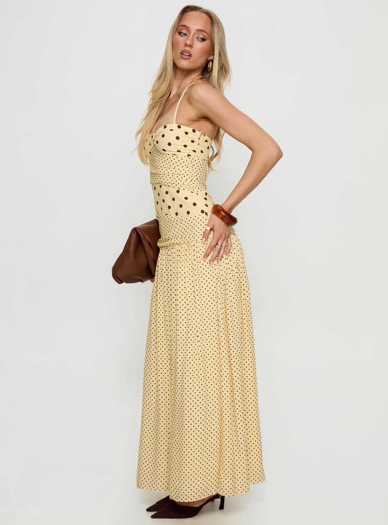 Yellow Polka Dot Halter Prom Dress with Sweetheart Neckline and Flowy Maxi Skirt for Formal Events and Prom Nights